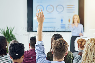 Buy stock photo Shot of a group of businesspeople raising their hands in a class