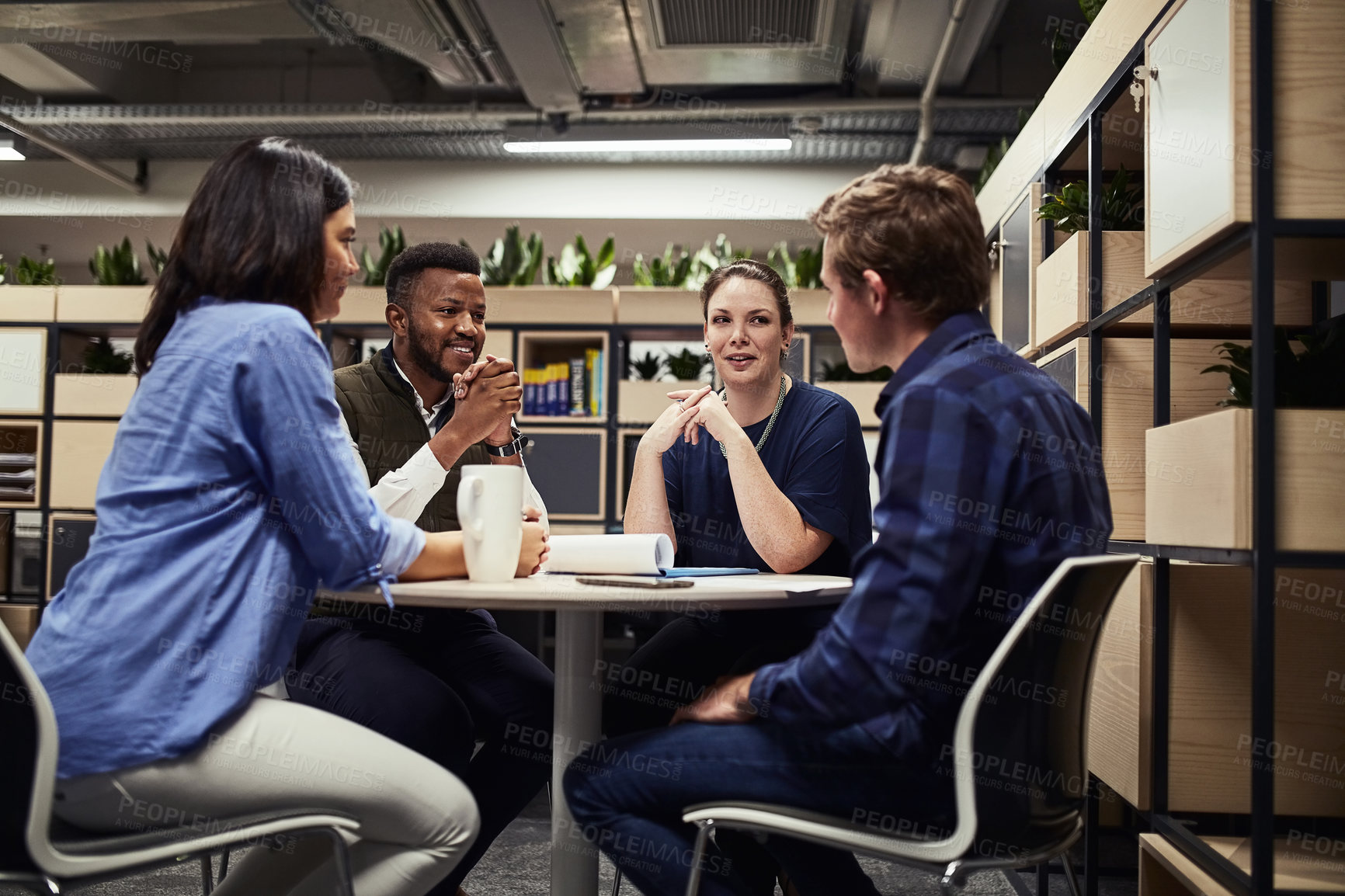 Buy stock photo Shot of a group of designers having a meeting in an office