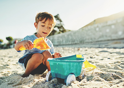 Buy stock photo Shot of a young boy at the beach