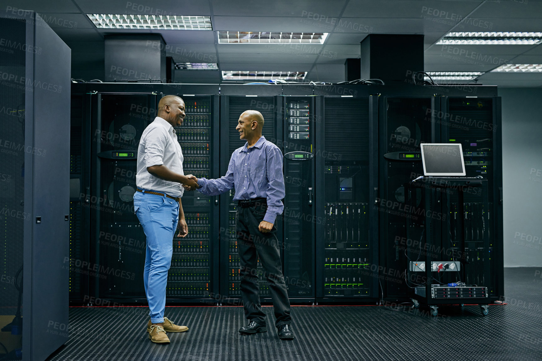 Buy stock photo Handshake, partnership or men in server room of data center worker with a thank you hand shake for help. B2b deal agreement, shaking hands or people in collaboration for network glitch or IT support