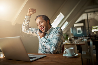 Buy stock photo Man, laptop and excited with fist pump in phone call in restaurant with good news or achievement as freelancer. Male person, remote work and happy as journalist for communication and networking