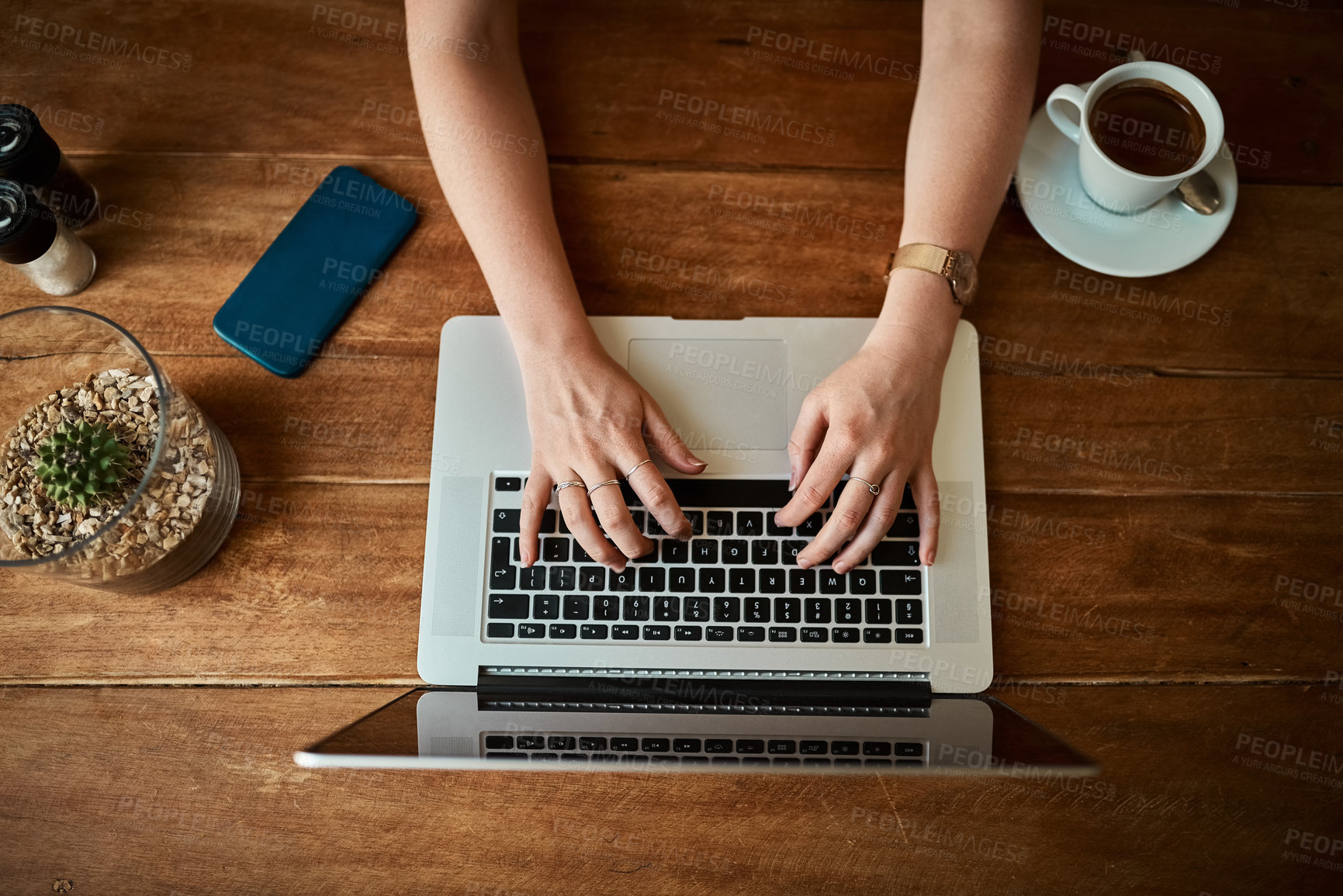 Buy stock photo Above, hands and typing on laptop at coffee shop as journalist for headline story or article. Person, restaurant and remote work with blog writing as freelancer for creativity and research for trends