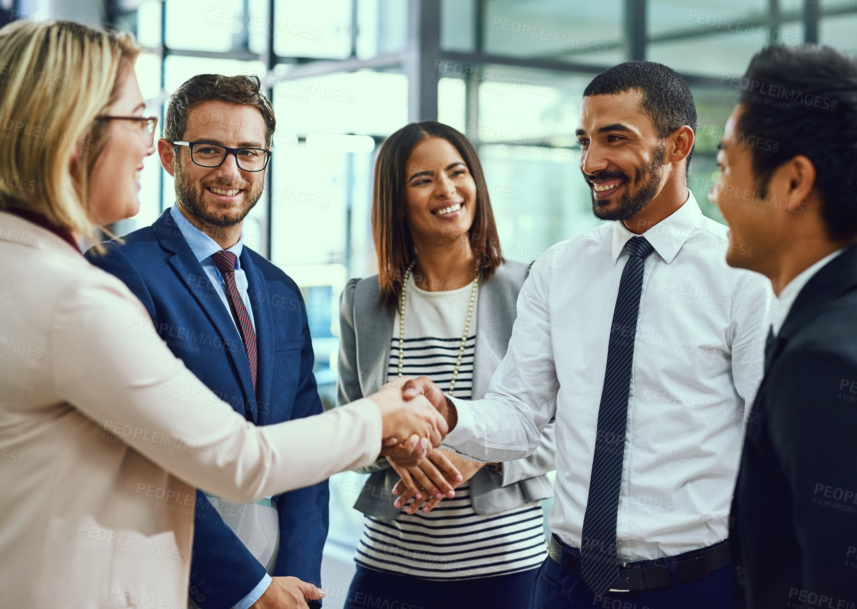 Buy stock photo Group, business people and handshake for welcome, introduction or greeting in office. Shaking hands, smile and team with deal for collaboration, agreement or thank you for b2b partnership opportunity