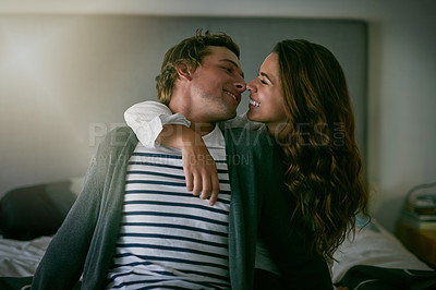 Buy stock photo Cropped shot of a loving young couple spending the day together at home