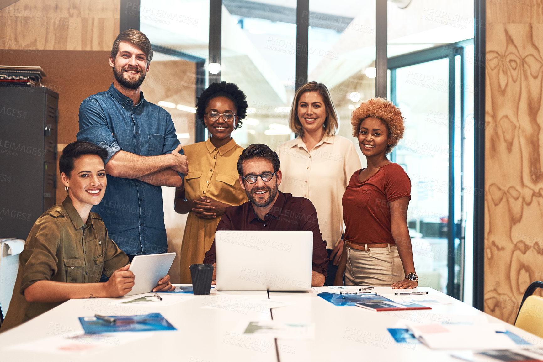 Buy stock photo Portrait of a diverse group of businesspeople working together in an office