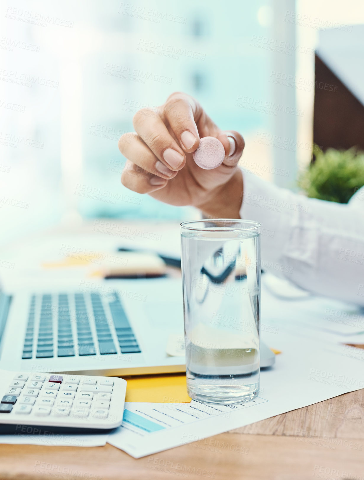 Buy stock photo Businessperson, hands and water with pill for medication, daily dosage or remedy at office. Closeup of employee with glass of mineral liquid and dissolving tablet for pharmaceutical cure at workplace