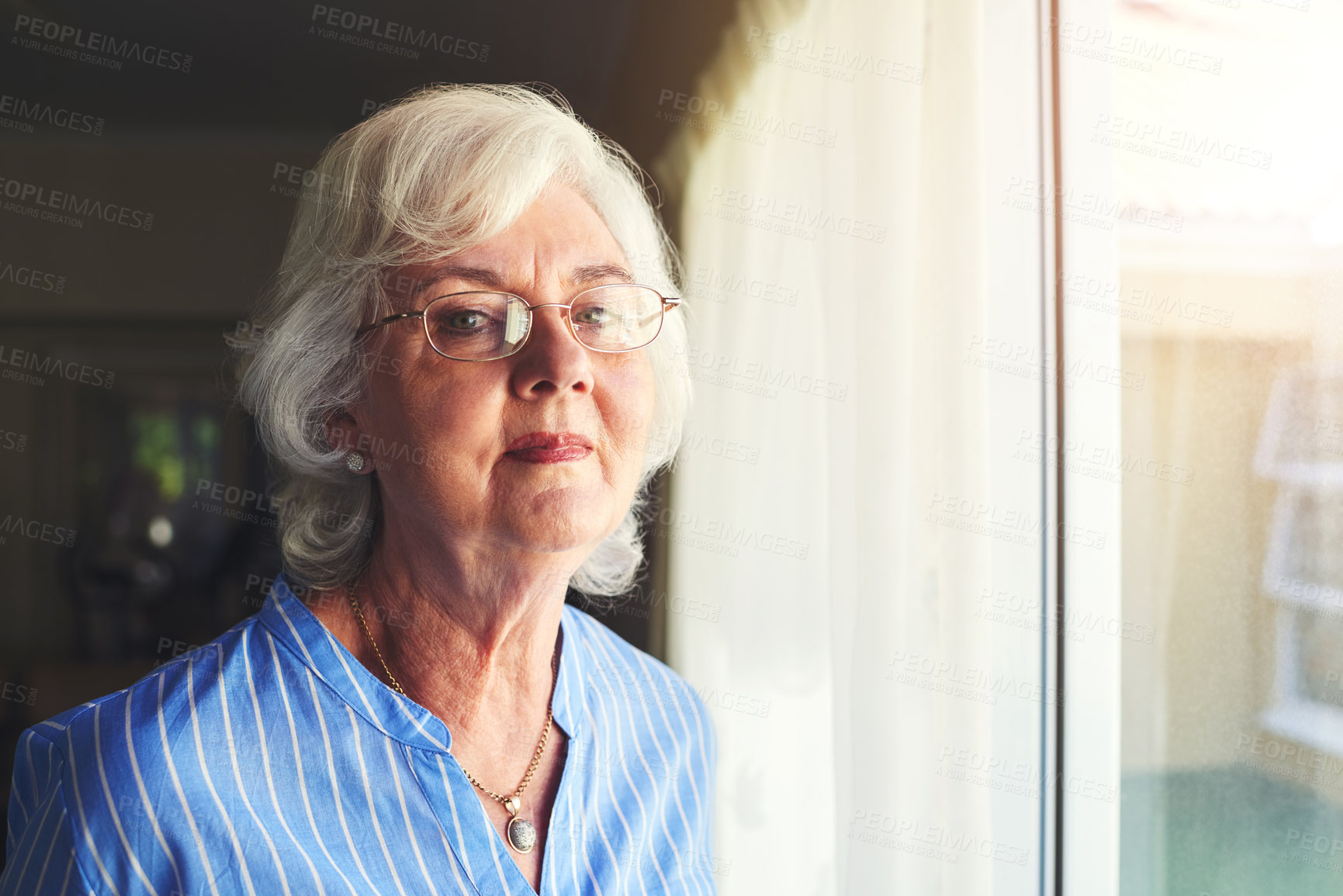 Buy stock photo Glasses, happy and portrait of senior woman by window in home with positive attitude for retirement. Smile, memory and elderly female person from Ireland with dementia remembering past at house.