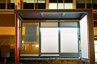 Buy stock photo Street sign, billboard and night with bus stop or mockup space for advertising, message or notification in city. Empty poster, banner or post for brand, logo or marketing on sidewalk in late evening