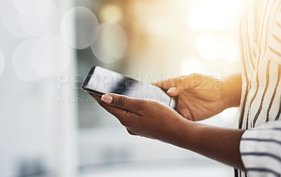 Buy stock photo Closeup of female hands chatting or typing a text message to a friend on social media on a phone. Woman reading and replying to a work email. A lady playing a mobile game online 
