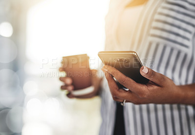 Buy stock photo Closeup of a casual business woman using a phone for communicating with clients while working remotely from home with flare. Professional black female employee holding her work and personal cellphone