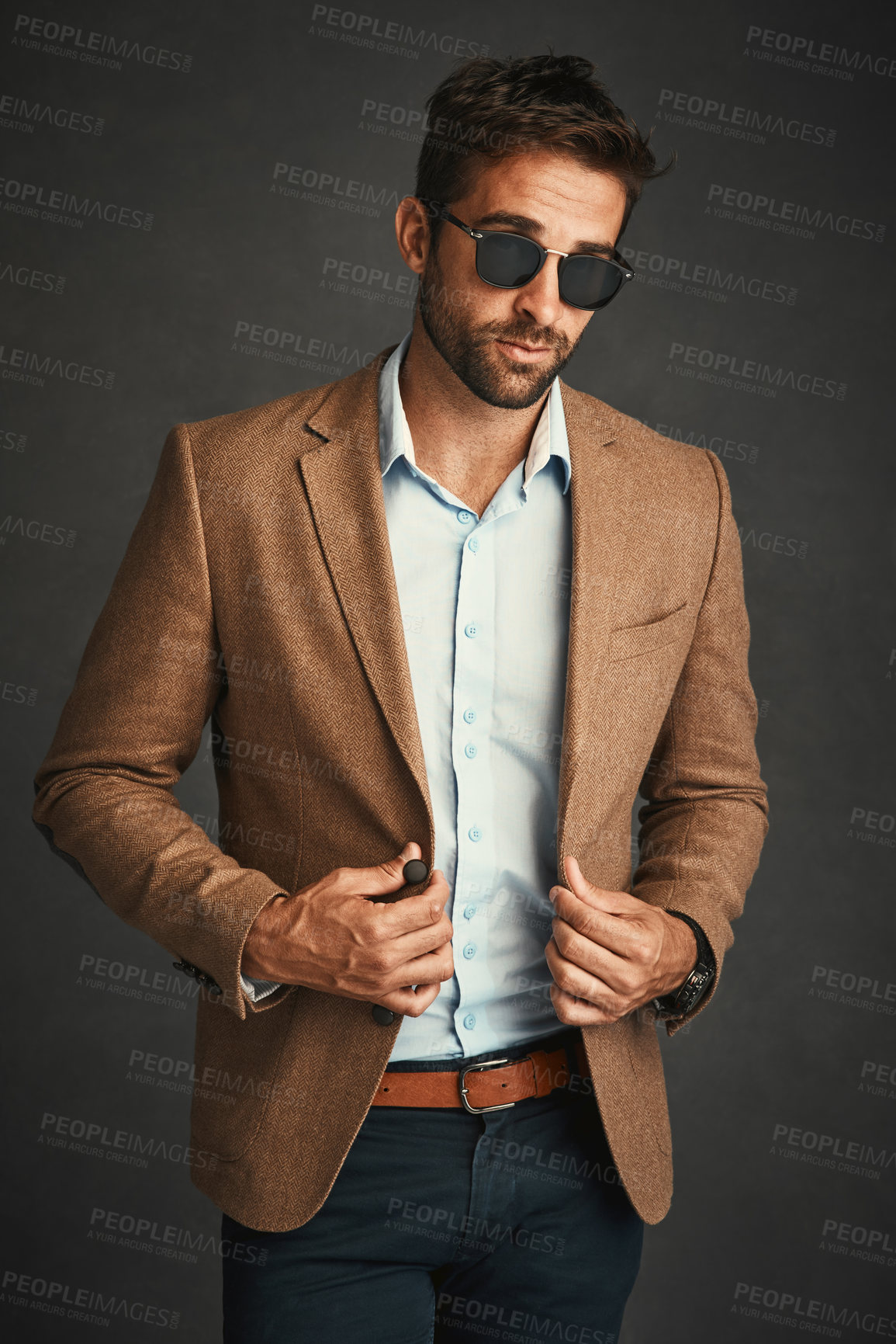 Buy stock photo Fashion, man and sunglasses for pride in studio with stylish, trendy and smart luxury clothes as Professor. Confident, male person and designer eyewear, elegant and brand blazer on grey background
