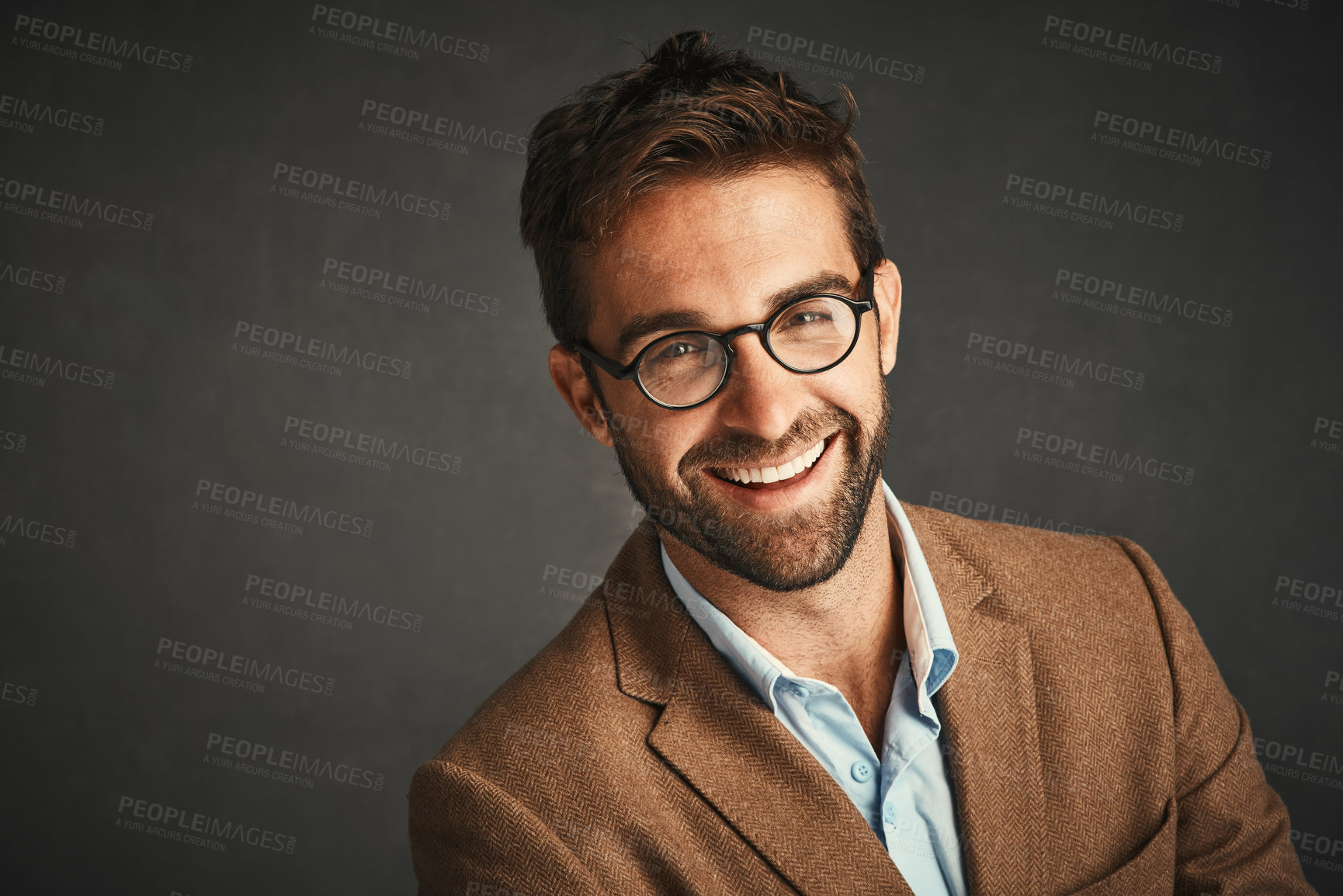 Buy stock photo Smile, portrait and man with eyewear in studio for stylish fashion, designer brand and aesthetic frame design. Pensive, male person and glasses, health and lens care at optometry on grey background