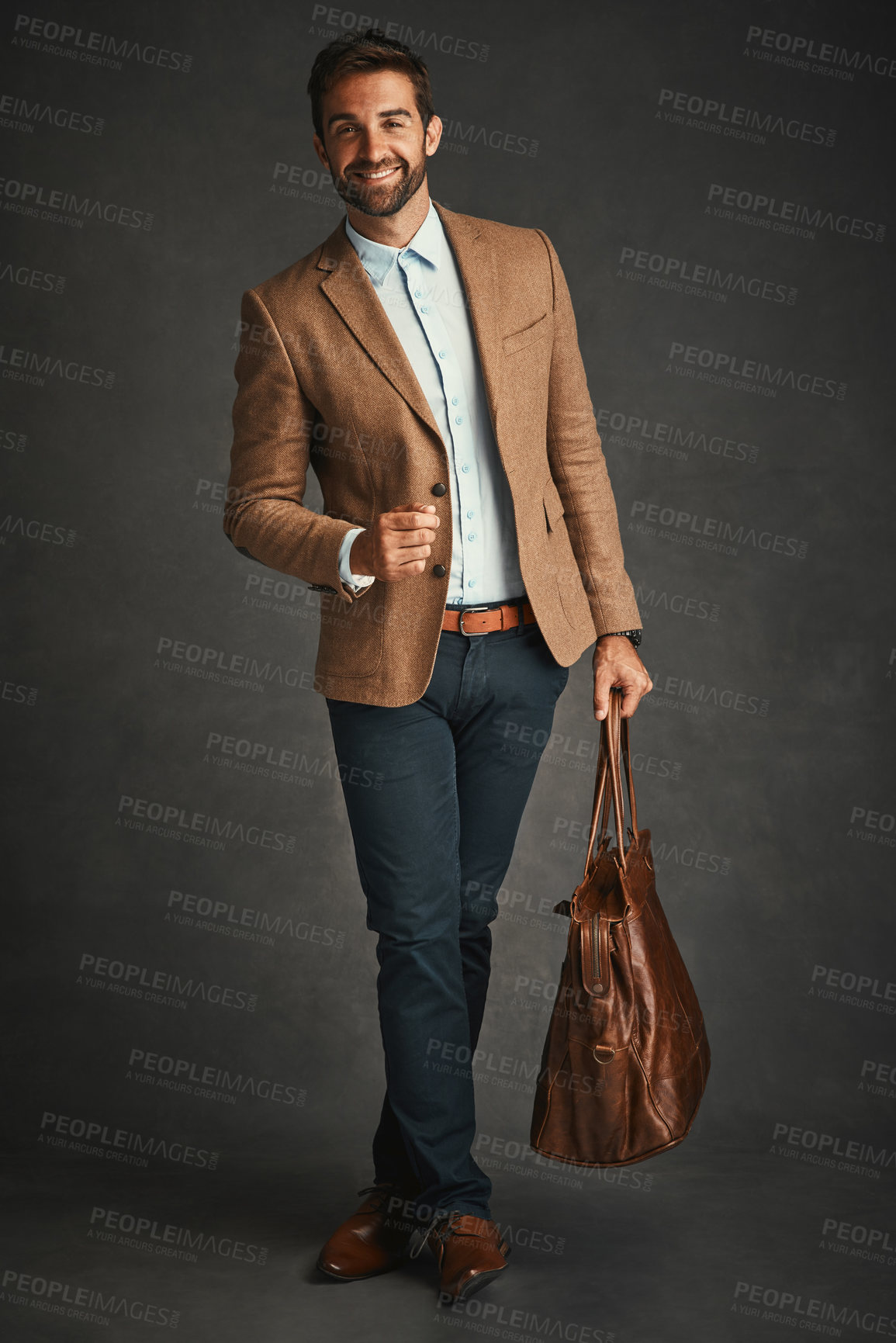 Buy stock photo Professor, portrait and studio with luggage for travel, work style or smart casual fashion for professional confidence. Man, gray background and bag with jacket or cool, trendy blazer in Chicago