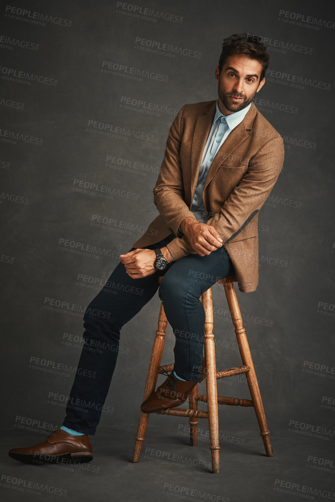 Buy stock photo Fashion, chair and portrait of business man in studio with trendy style, outfit and formal clothes. Professional, happy entrepreneur and person with confidence, pride and career on gray background