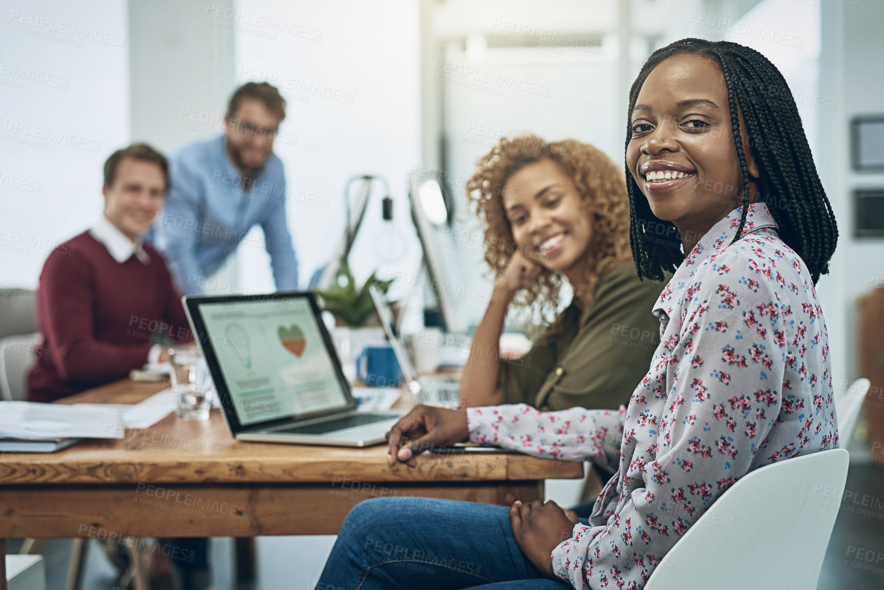 Buy stock photo Portrait, smile and business woman with team for internship, coworking and planning at creative startup office. Manager, group and happy professional with logo for graphic design project in meeting