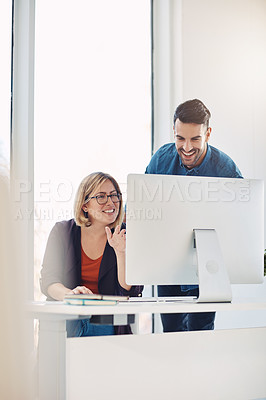Buy stock photo Social media agents planning on computer, talking and sharing marketing plans or strategy ideas. Smiling, happy and confident creatives searching, browsing or designing promotion on office technology