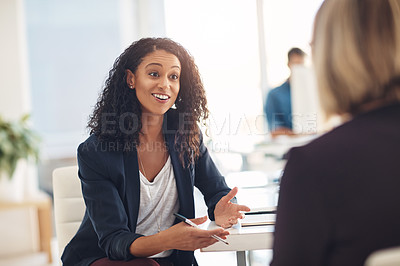 Buy stock photo Interview with a happy, excited and confident human resources manager talking to a shortlist candidate for a job. Young business woman meeting with a colleague or coworker in her office at work