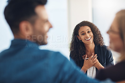 Buy stock photo Smiling psychologist looking happy, cheerful and successful after counseling a couple in routine marriage therapy in a clinic. Proud mental healthcare professional watching and admiring after helping