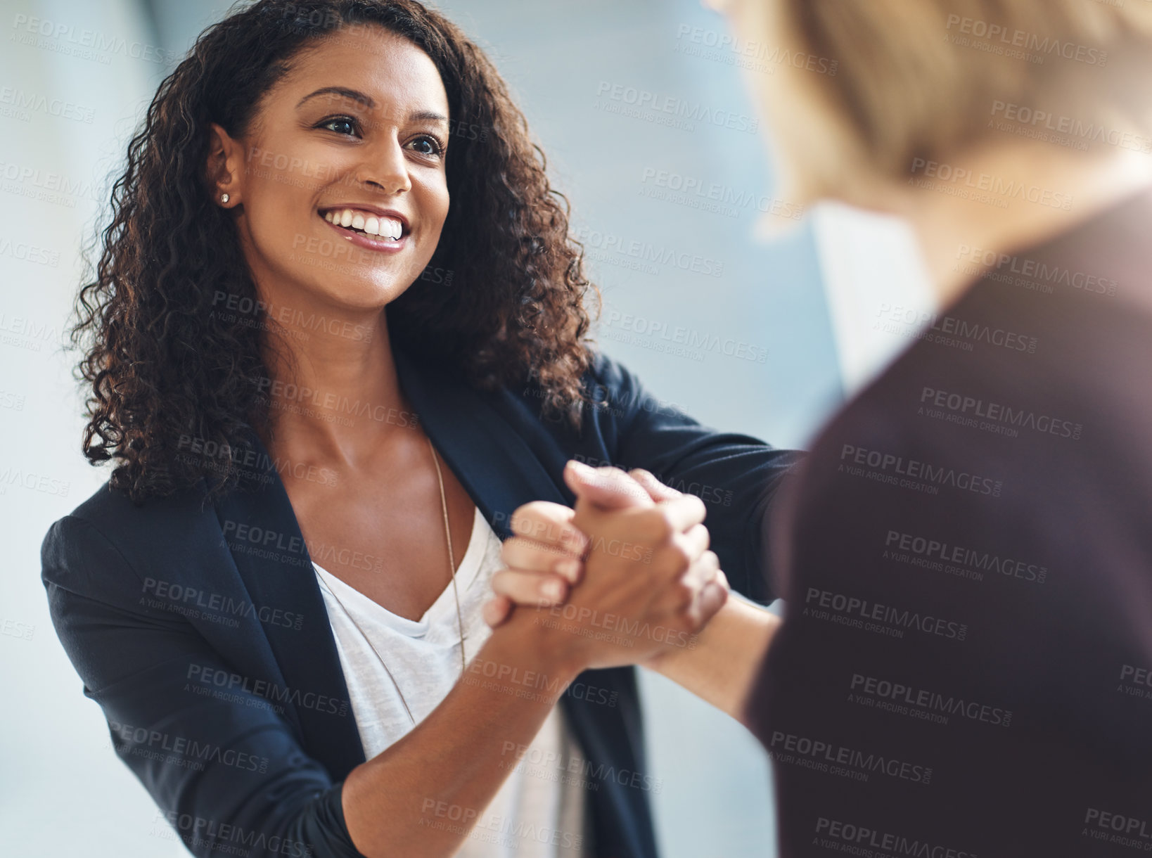 Buy stock photo Happy and diverse corporate business women giving handshake, welcoming to company and greeting in the morning at work. Professional worker, employee or smiling female getting promotion from manager