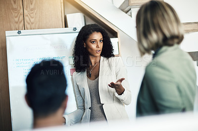 Buy stock photo Presentation meeting, communication and woman talking, planning and giving proposal, report or strategy plan. Project management, teamwork and biracial manager, leader or boss with sales pitch ideas