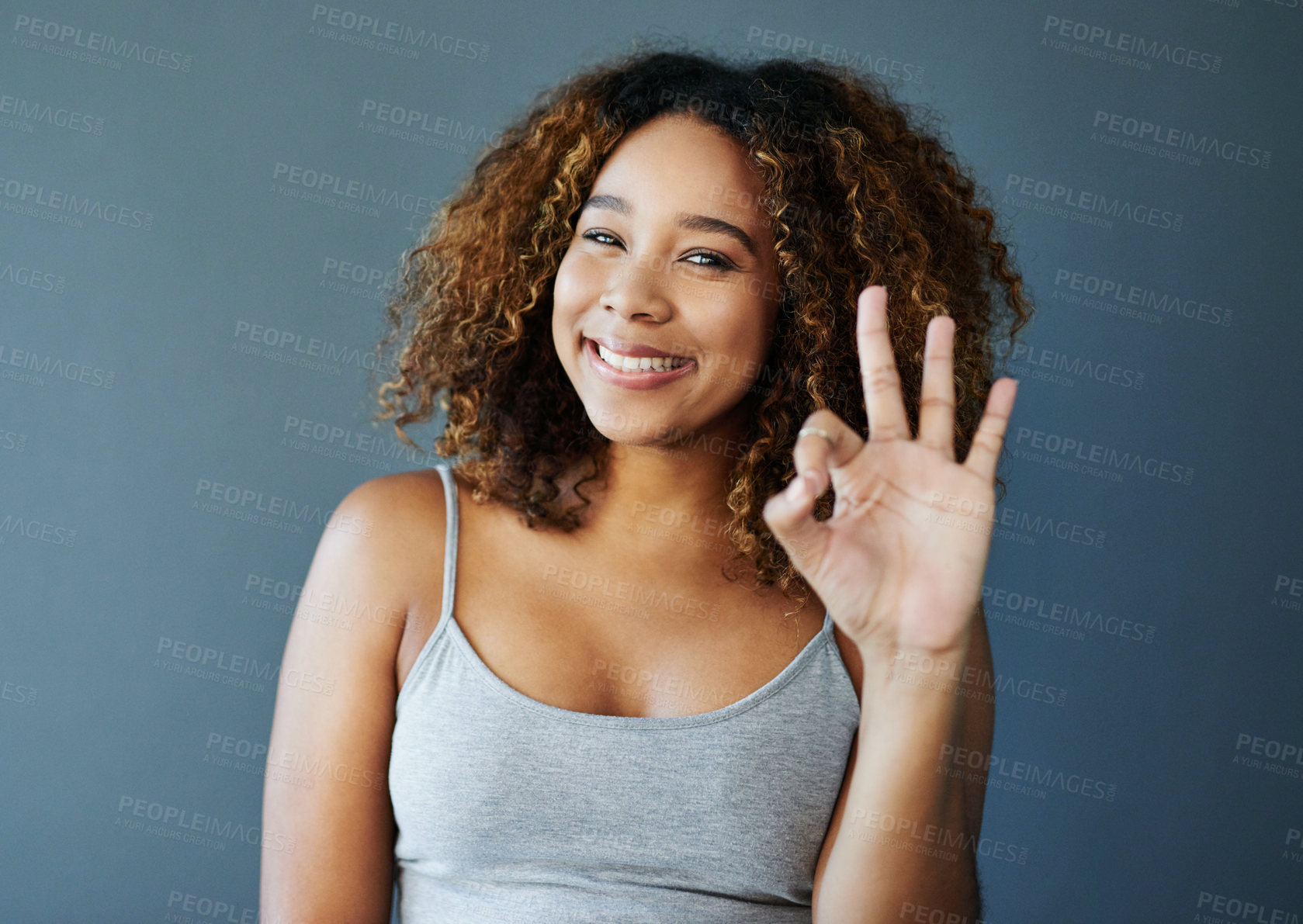 Buy stock photo Girl, smile and ok sign with studio portrait, emoji and decision with agreement by background. Woman, person and model with pride with icon, symbol and happy for choice with confidence in Costa Rica