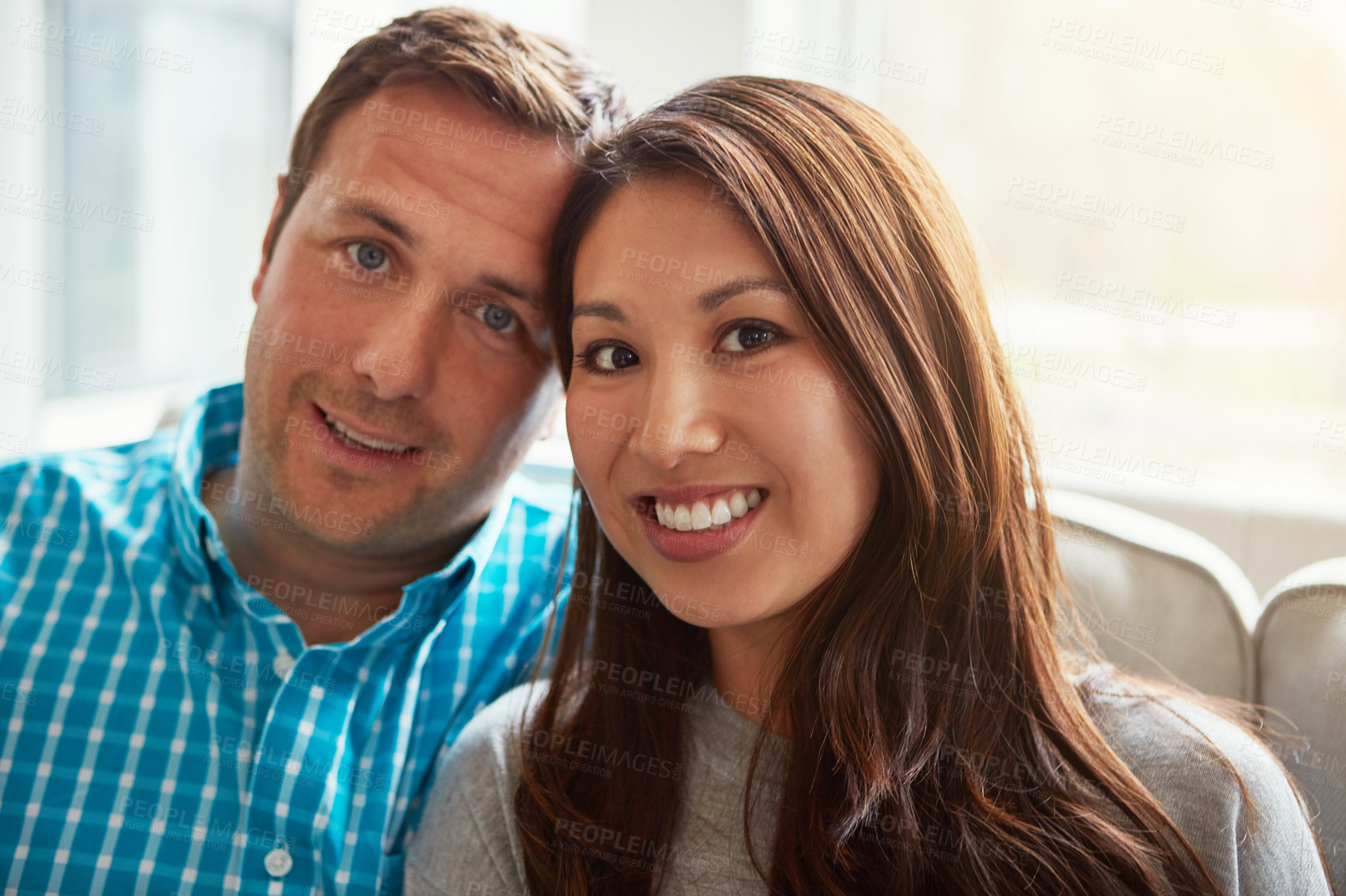 Buy stock photo Portrait of a happy young couple at home