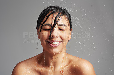 Buy stock photo Cleaning, shower and face of woman with water in studio on gray background for wellness, beauty and grooming. Skincare, bathroom and happy female person for washing hair, facial care and cleansing