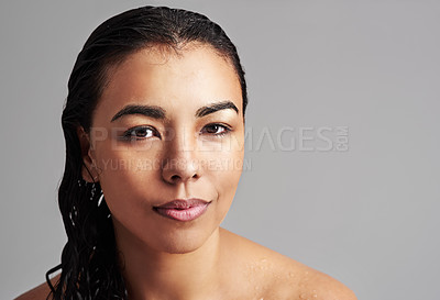 Buy stock photo Woman, portrait and beauty with makeup, skincare or haircare cosmetics on a gray studio background. Face of young female person or model with wet hair for hygiene or facial treatment on mockup space
