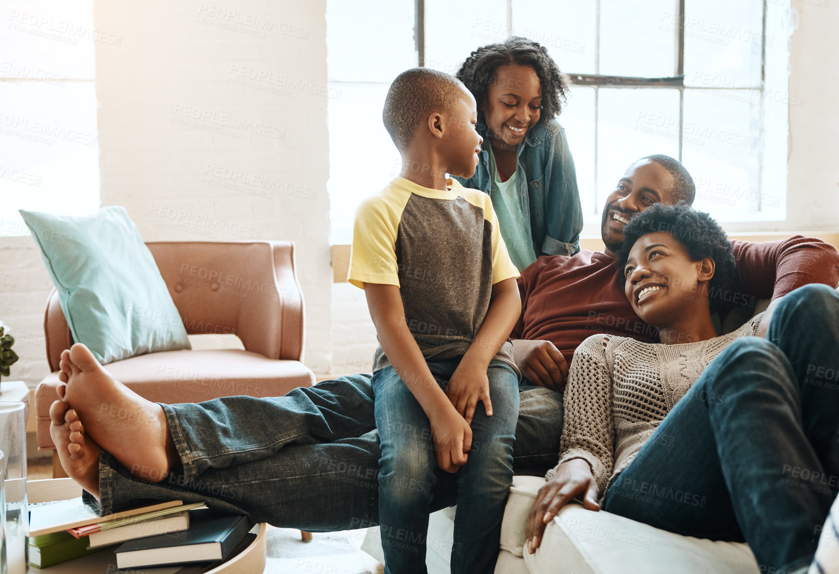 Buy stock photo Black family children, happy parents or relax African people smile together, bond and enjoy quality time. Happiness, love and young youth kids, easy father and mother lounge on home living room sofa