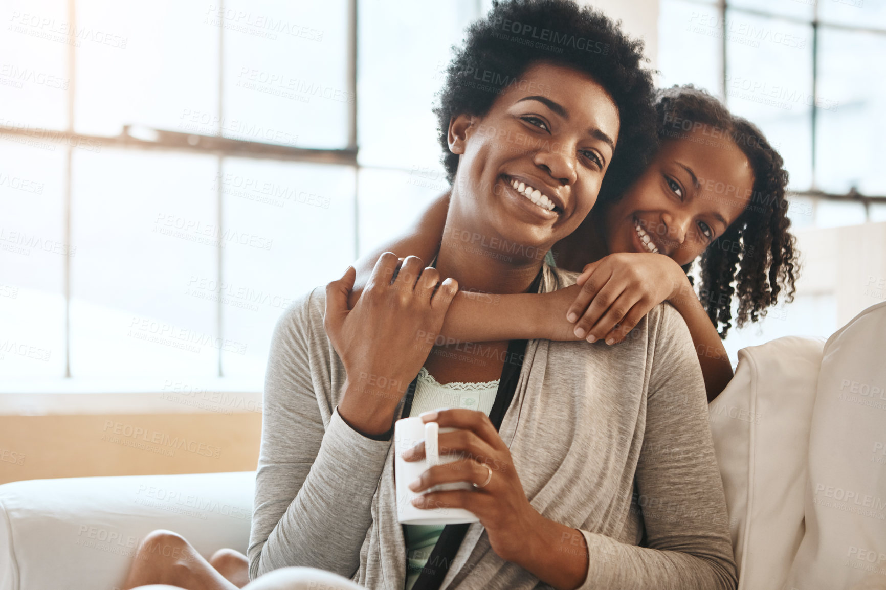 Buy stock photo Hug, happy and portrait of mother with child in home for bonding, relationship and relax on weekend. Black family, sofa and mom with girl embrace for affection, love and support in living room