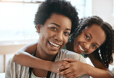 Buy stock photo Hug, laugh and portrait of mother with child in home for bonding, relationship and relax on weekend. Black family, happy and mom with girl embrace on sofa for affection, love and care in living room