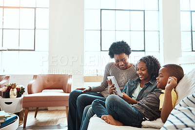 Buy stock photo Family with tablet, watch and relax at family home together, spending quality time together with technology. Black people, mother and children on sofa with device, internet wifi and social media