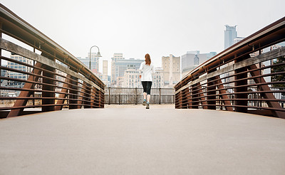 Buy stock photo Back, woman and runner by bridge in city, endurance and speed with fitness exercise Germany. Training, female running and preparation for marathon, challenge and healthy living with workout outdoor