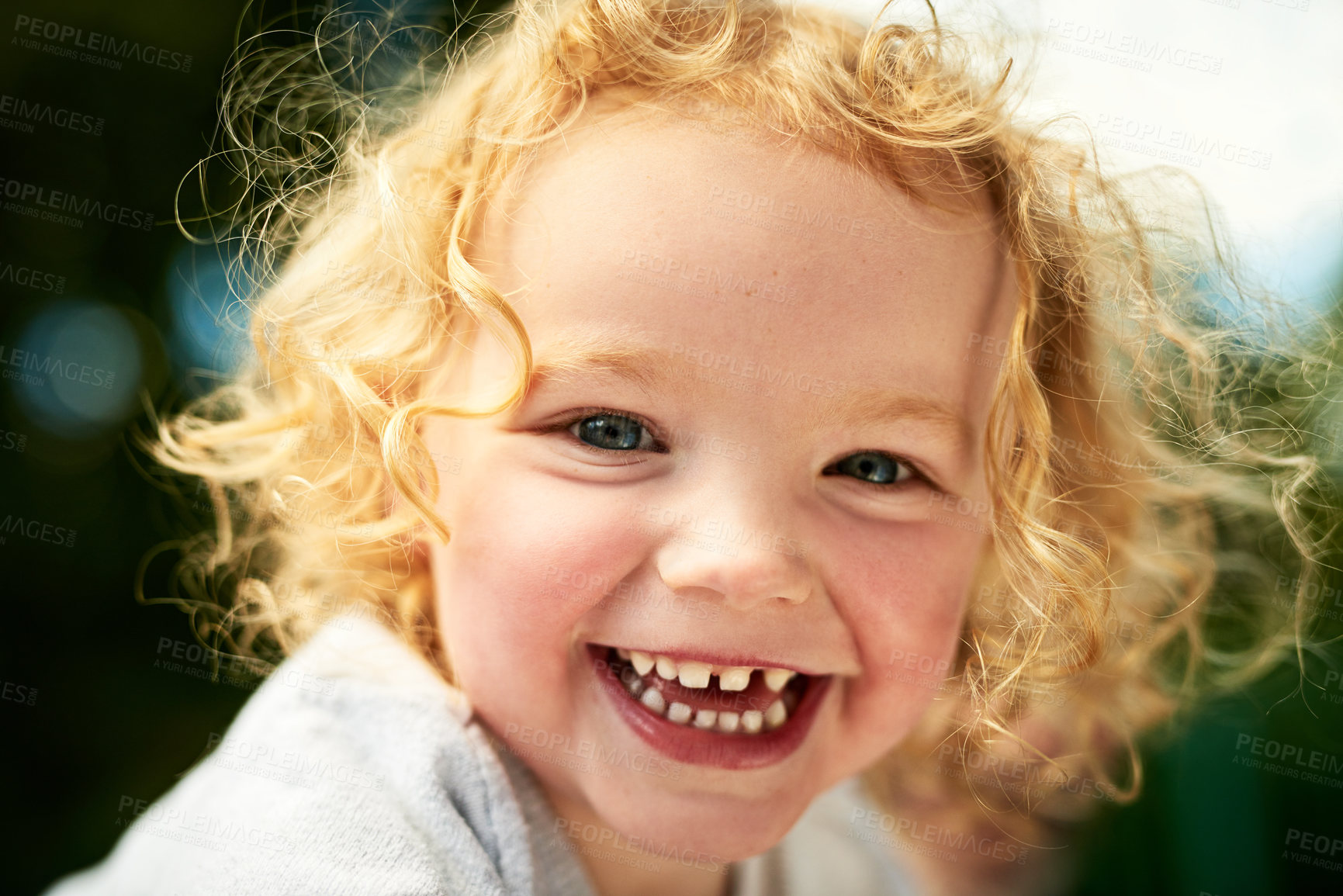 Buy stock photo Portrait of an adorable little girl having fun outdoors