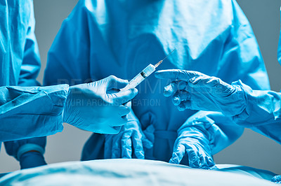 Buy stock photo Surgery, operating room and hands of doctor with needle for healthcare, teamwork and professional medicine. Medical innovation, syringe and surgeon with expert staff in hospital icu for operation. 