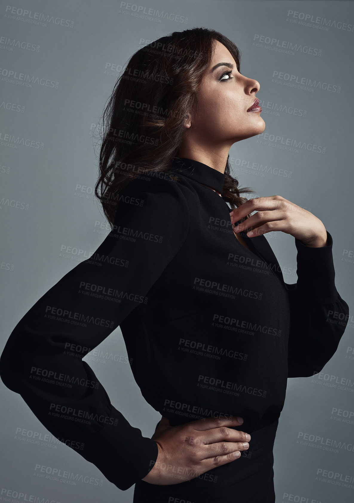 Buy stock photo Fashion, beauty and profile of woman in studio with elegant, classy and stylish outfit. Makeup, serious and female person with confidence for trendy clothes and facial cosmetics by gray background.