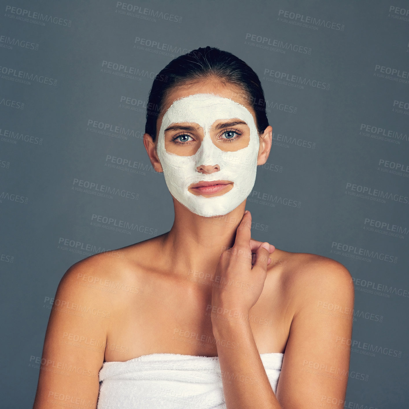 Buy stock photo Skincare, woman and confident with face mask in studio for beauty, self care and cosmetics on gray background. Female person, portrait and cream for facial, transformation and routine with detox