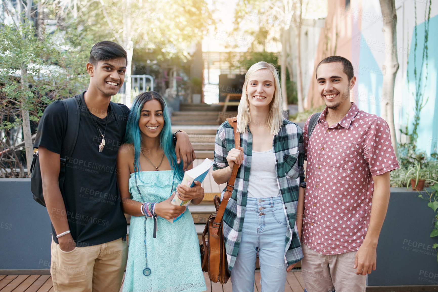 Buy stock photo Portrait, friends and happy students at college on campus outdoor for education, learning or diversity. Smile, university and group of young people together for scholarship, bonding and book to study