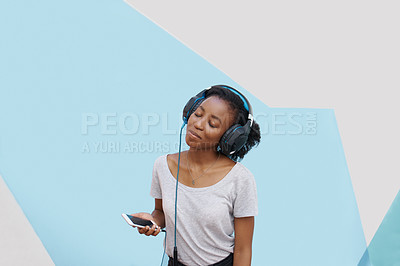 Buy stock photo Black girl, headphones and phone for sound in studio, website and online for streaming playlist on backdrop. Female person, mockup space and internet for social media, kpop and app for music or fun