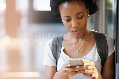Buy stock photo Phone, research and black woman networking at university with mobile app, internet or website. Contact, technology and African student type and read email online with cellphone at college campus.