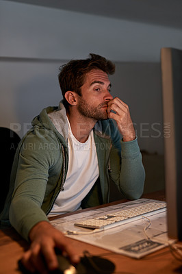Buy stock photo Cropped shot of a young designer working late in the office
