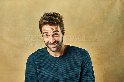 Buy stock photo Portrait, man and smile in studio for casting agency for modeling, designer brand and hipster style. Handsome face, fashion and model by backdrop for winter clothes, gold color and cool hairstyle
