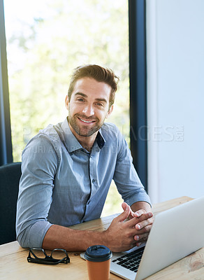 Buy stock photo Portrait, business man and smile with laptop in desk at office in startup company as architect. Entrepreneur, table and happy for research, ideas and planning on internet for creativity or project