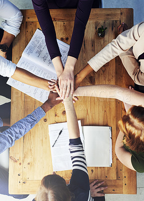 Buy stock photo Creative people, hands together and teamwork with documents above for collaboration, support or trust at office. Top view of group or employees piling with paperwork for agreement, meeting or startup