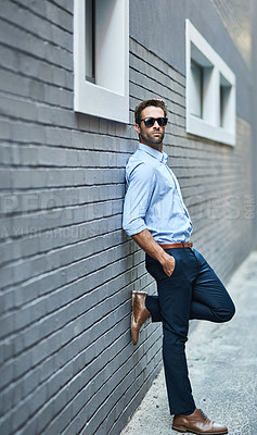 Buy stock photo Man, brick and wall with vision, confidence and sunglasses with urban background. Consultant, startup and business with ambition, style and formal or professional aesthetic for corporate fashion