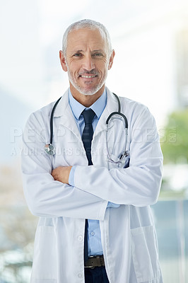 Buy stock photo Doctor, confidence and portrait of mature man in a hospital at a cancer research clinic with arms crossed. Professional, medical employee and uniform with healthcare, wellness and health consultant