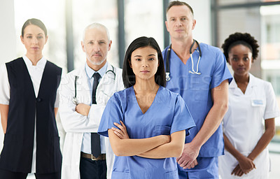 Buy stock photo Healthcare, team and portrait of doctors with nurses in hospital with arms crossed for leadership or support. Diversity, mindset and proud face of medical group in solidarity or service collaboration