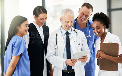 Buy stock photo Digital tablet, team and group of healthcare workers in discussion on xrays in medicare clinic. Collaboration, diversity and professional medical employees analyzing a diagnosis on mobile in hospital