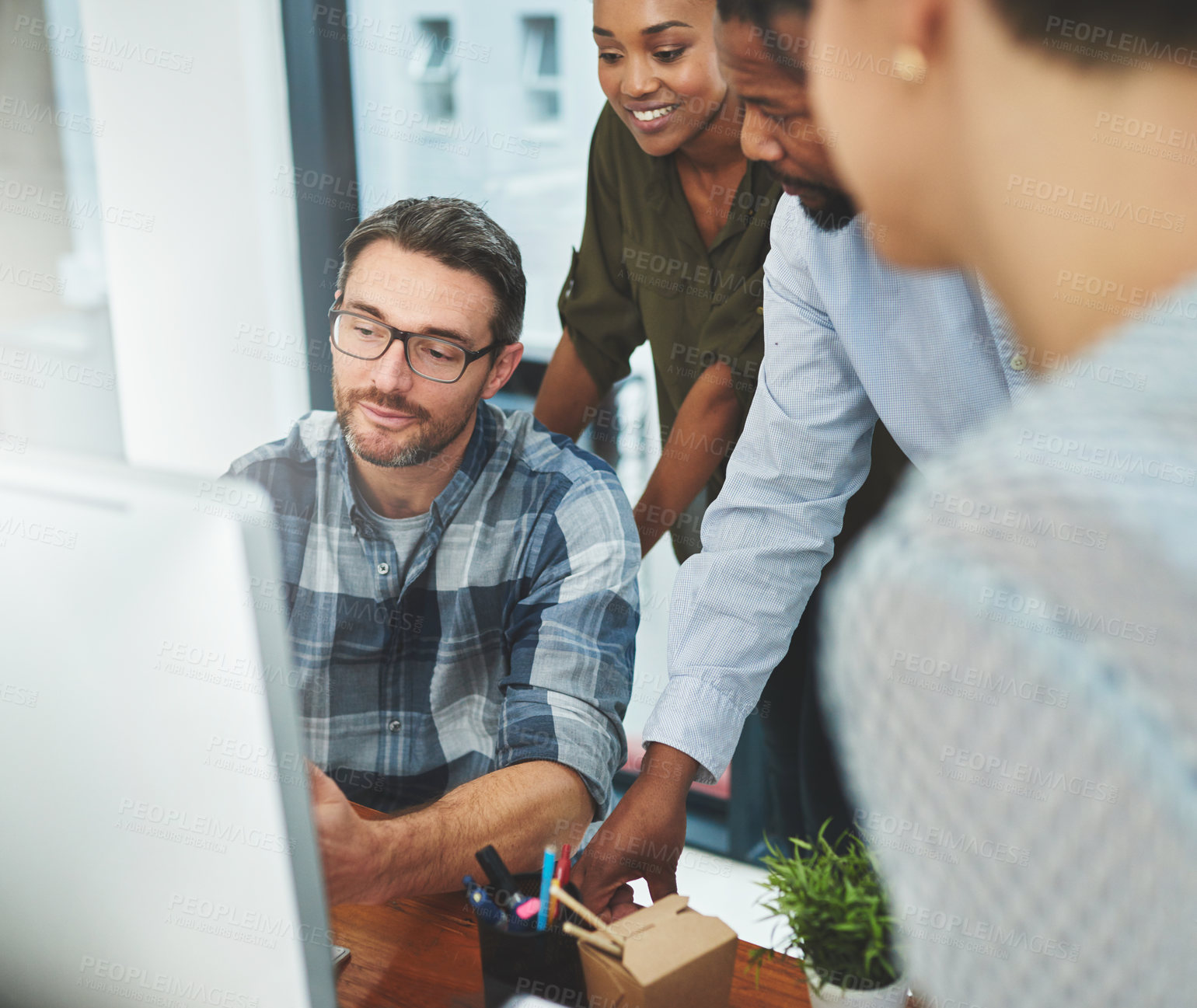 Buy stock photo Shot of businesspeople working together in the office 