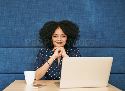 Buy stock photo Shot of a young female designer working in her office